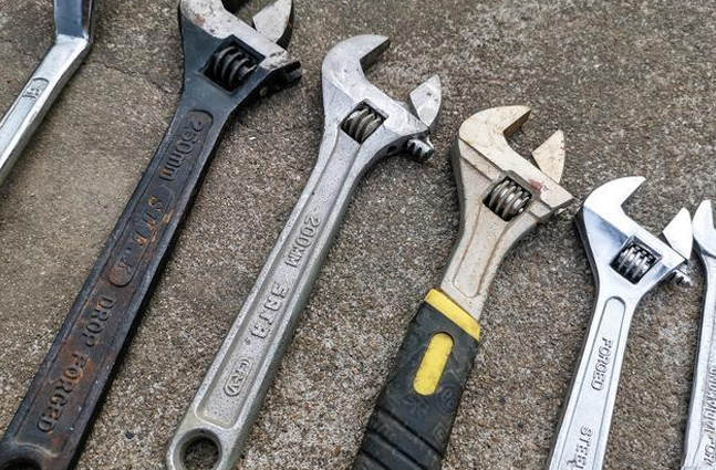 What are the basic types of wrenches?